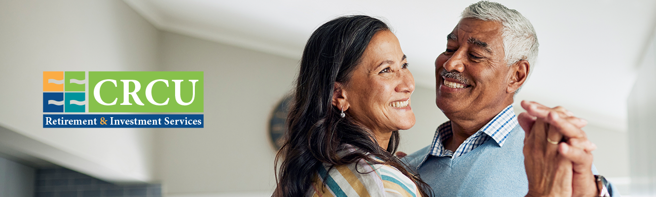Retirement and investment services banner, featuring an elderly couple standing together and smiling.

