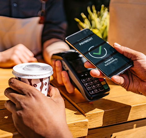 Digital wallet payment being made at a payment terminal.
